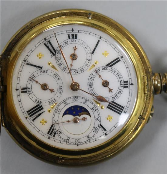 An engine turned gilt metal triple calendar and moonphase pocket watch.